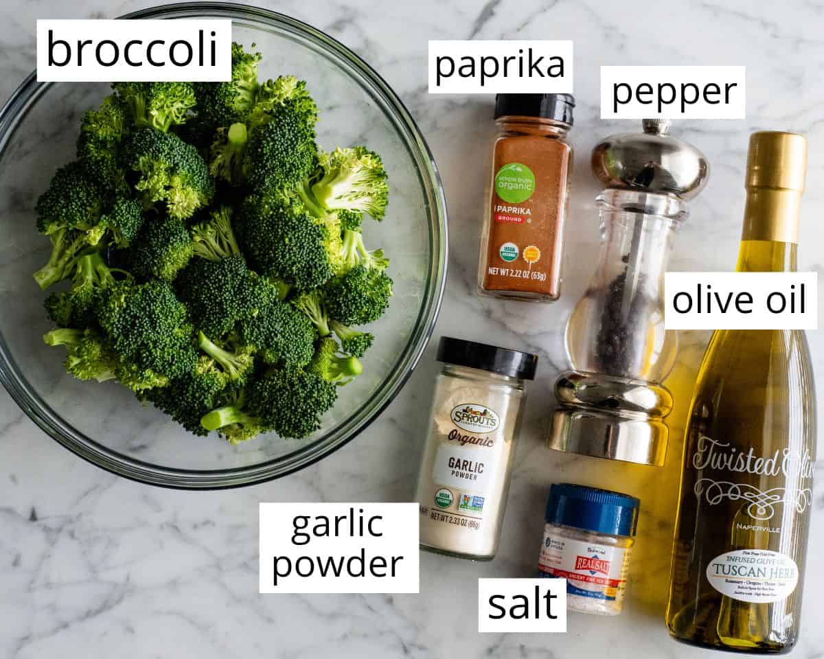 overhead view of the labeled ingredients in this roasted broccoli recipe