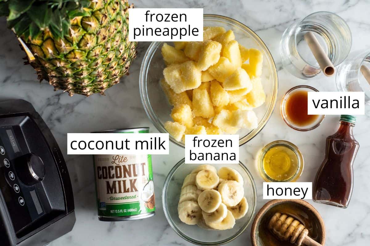 overhead view of the labeled ingredients in this pineapple smoothie recipe