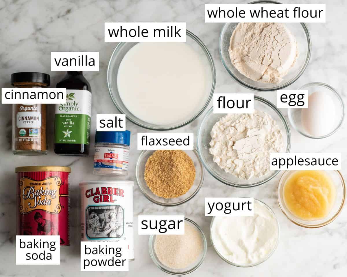 Overhead view of the labeled ingredients in this whole wheat pancakes recipe