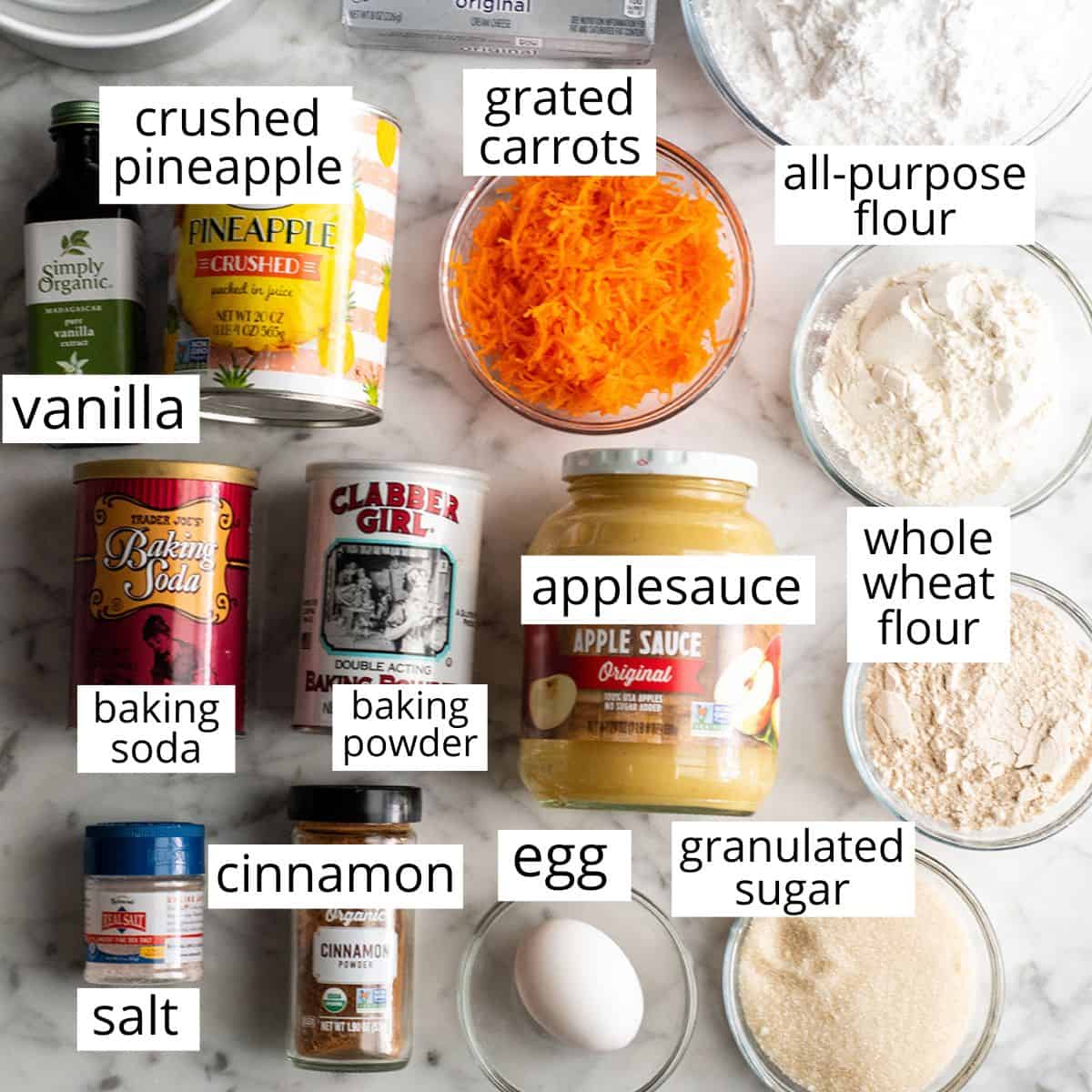overhead photo of the labeled ingredients in this healthy carrot cake recipe