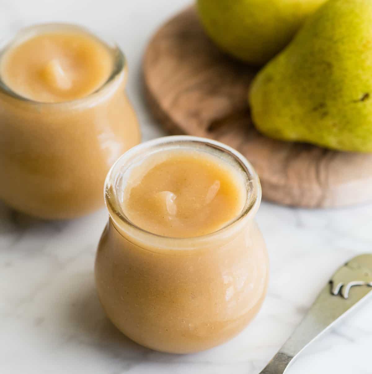 two jars of homemade baby food pear puree