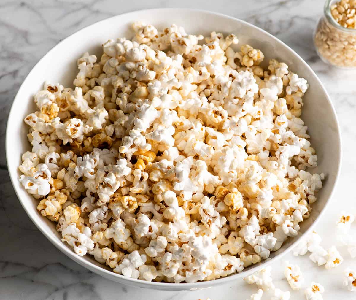front view of a large white bowl of kettle corn