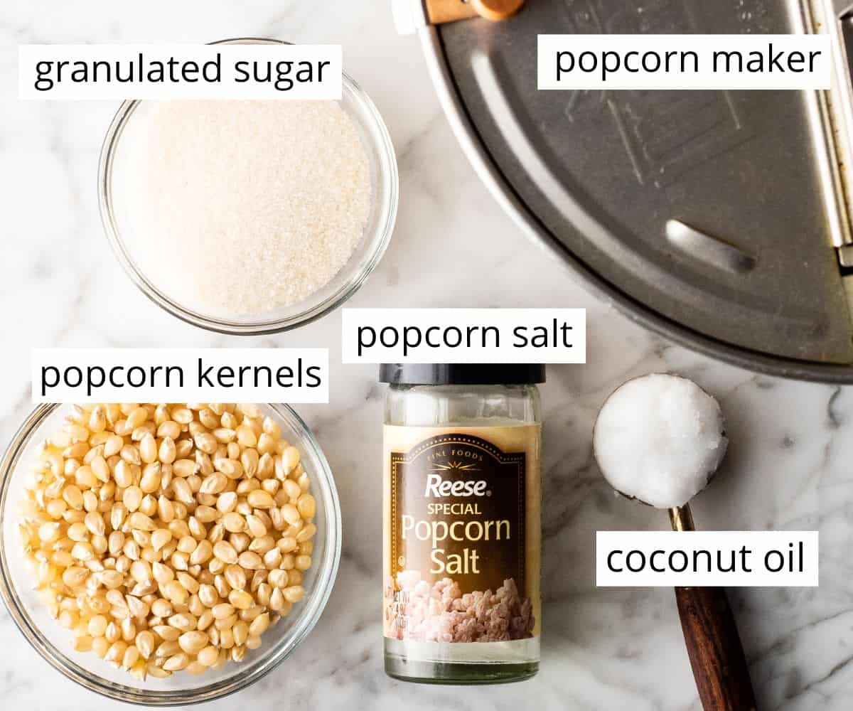 overhead view of the labeled ingredients in this homemade kettle corn recipe