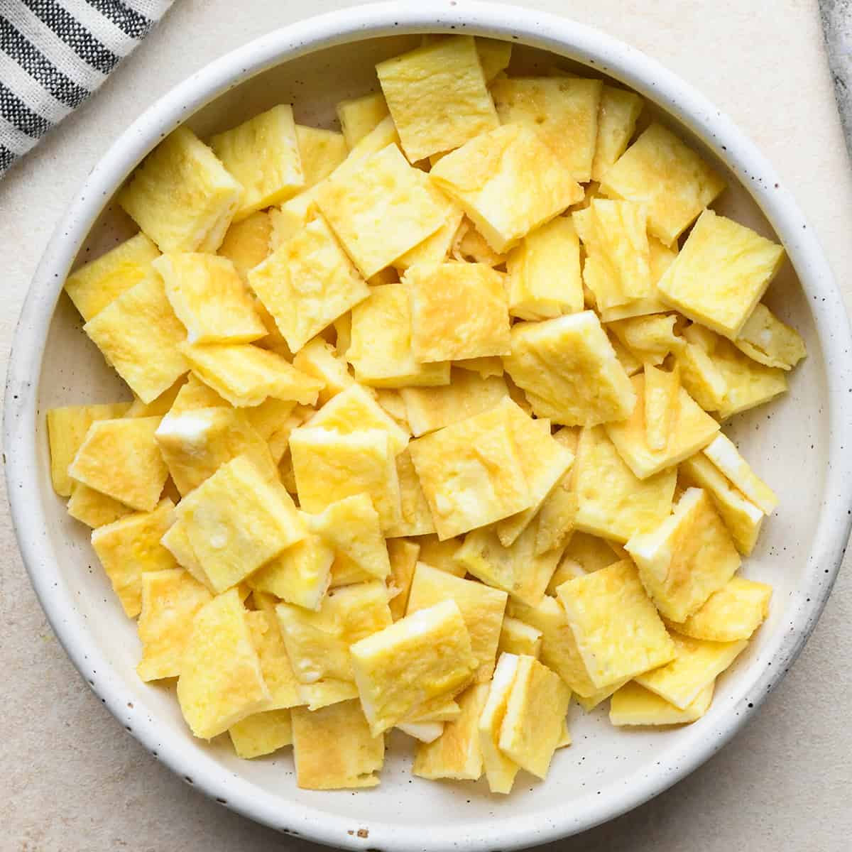 eggs cut into small squares in a bowl