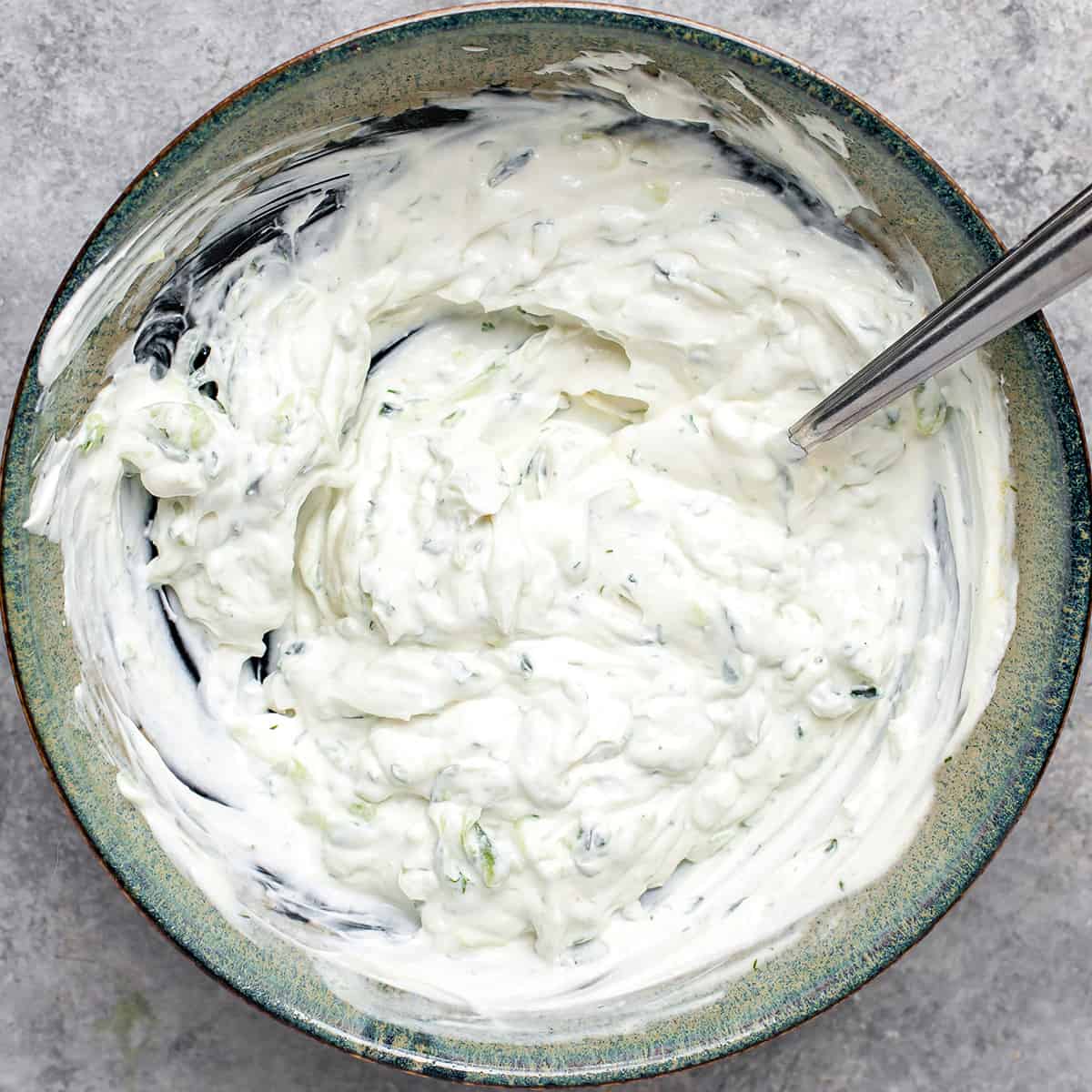How to Make Tzatziki Sauce - finished sauce in a bowl ready to chill