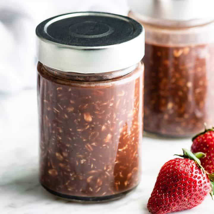 chocolate overnight oats recipe in a glass jar with the lid on