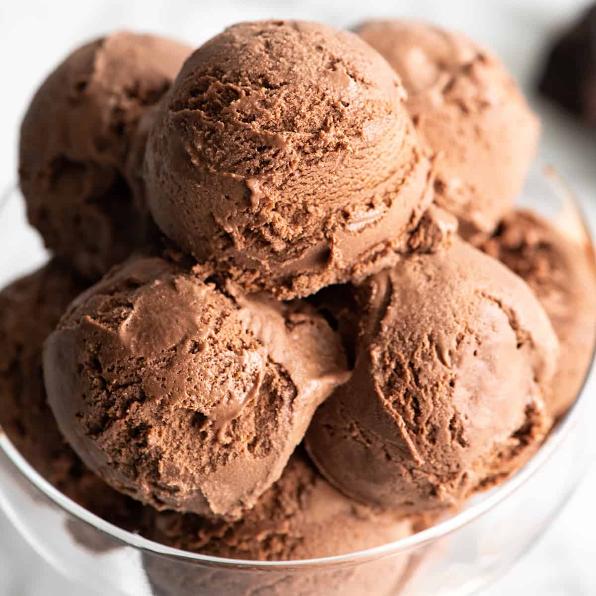 up close view of chocolate ice cream in a glass dish