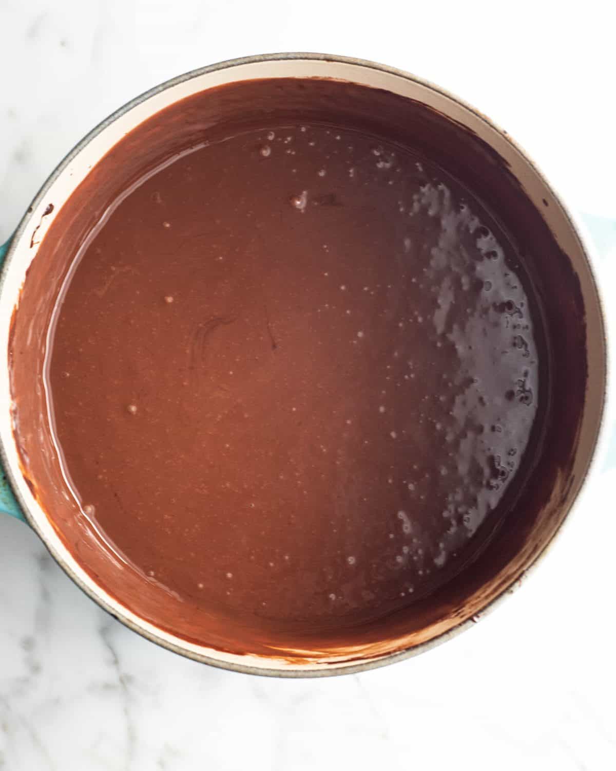 how to make chocolate ice cream - chocolate mixture in a pot after whisking additional cream in it