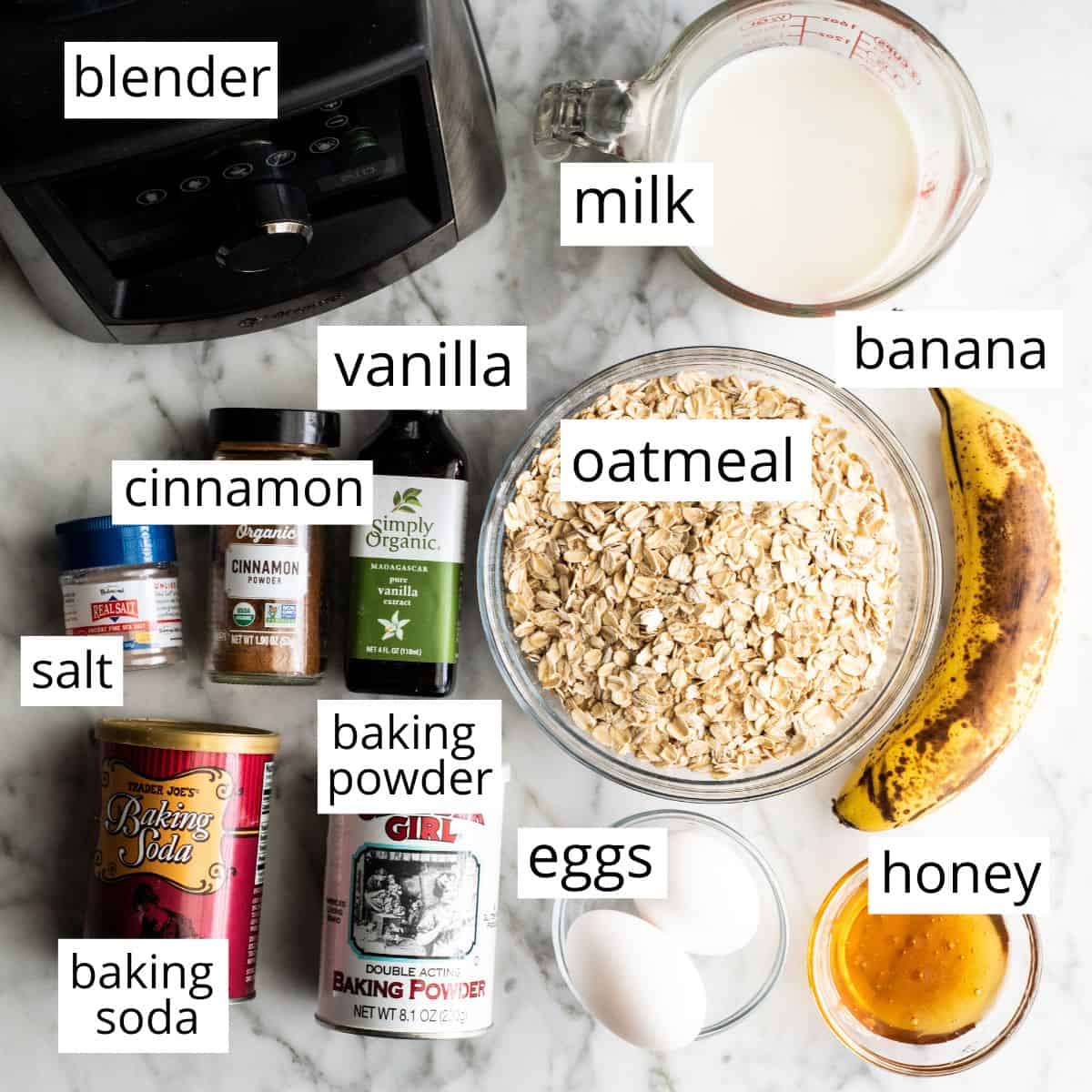 overhead view of the labeled ingredients in this banana oatmeal pancakes recipe