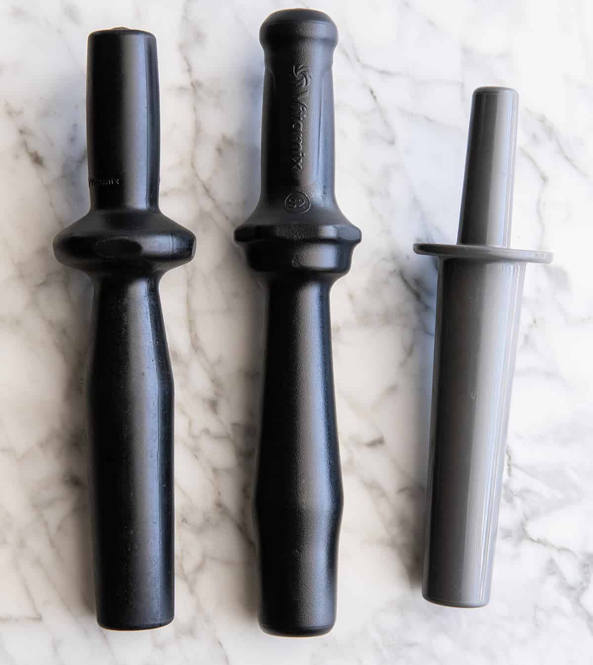 overhead view of 3 different Vitamix tampers