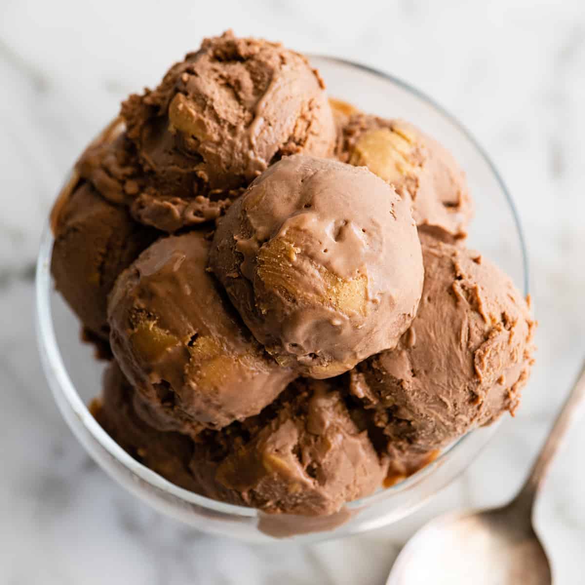 scoop of Homemade Chocolate Peanut Butter Ice Cream in a glass dish