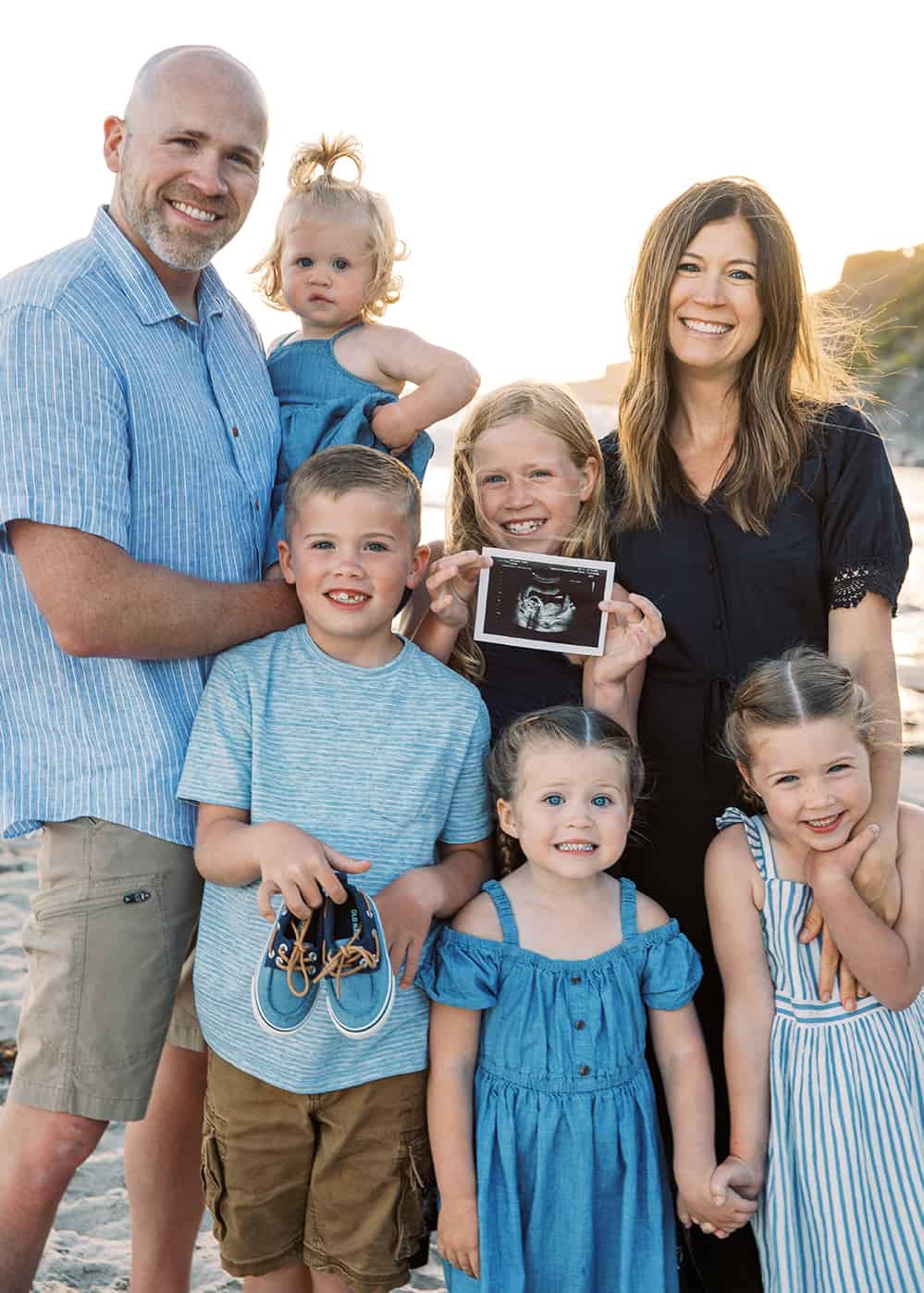 It's a boy! Pregnancy announcement photo and gender reveal with siblings. 