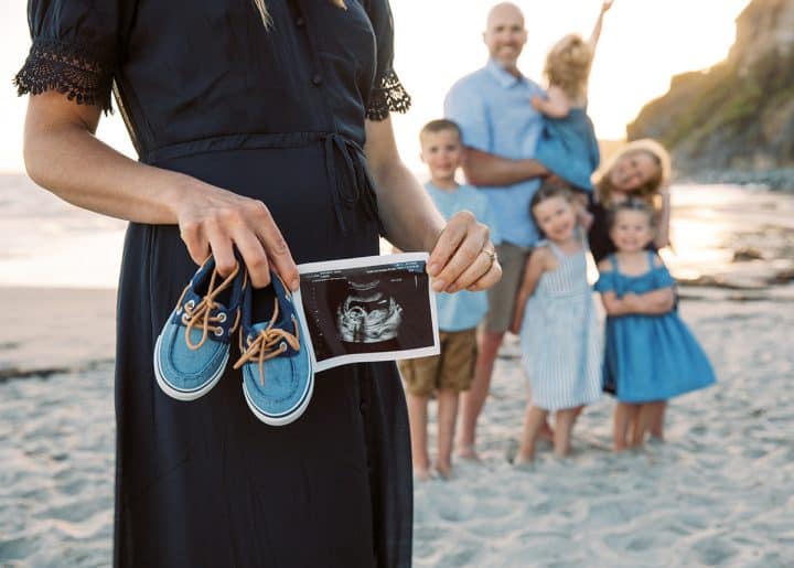 It's a boy! Pregnancy announcement photo and gender reveal with siblings. 