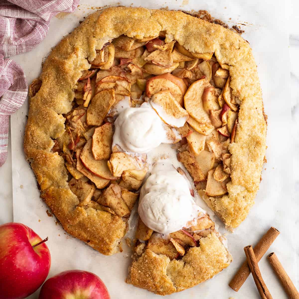 overhead view of an apple galette with vanilla ice cream