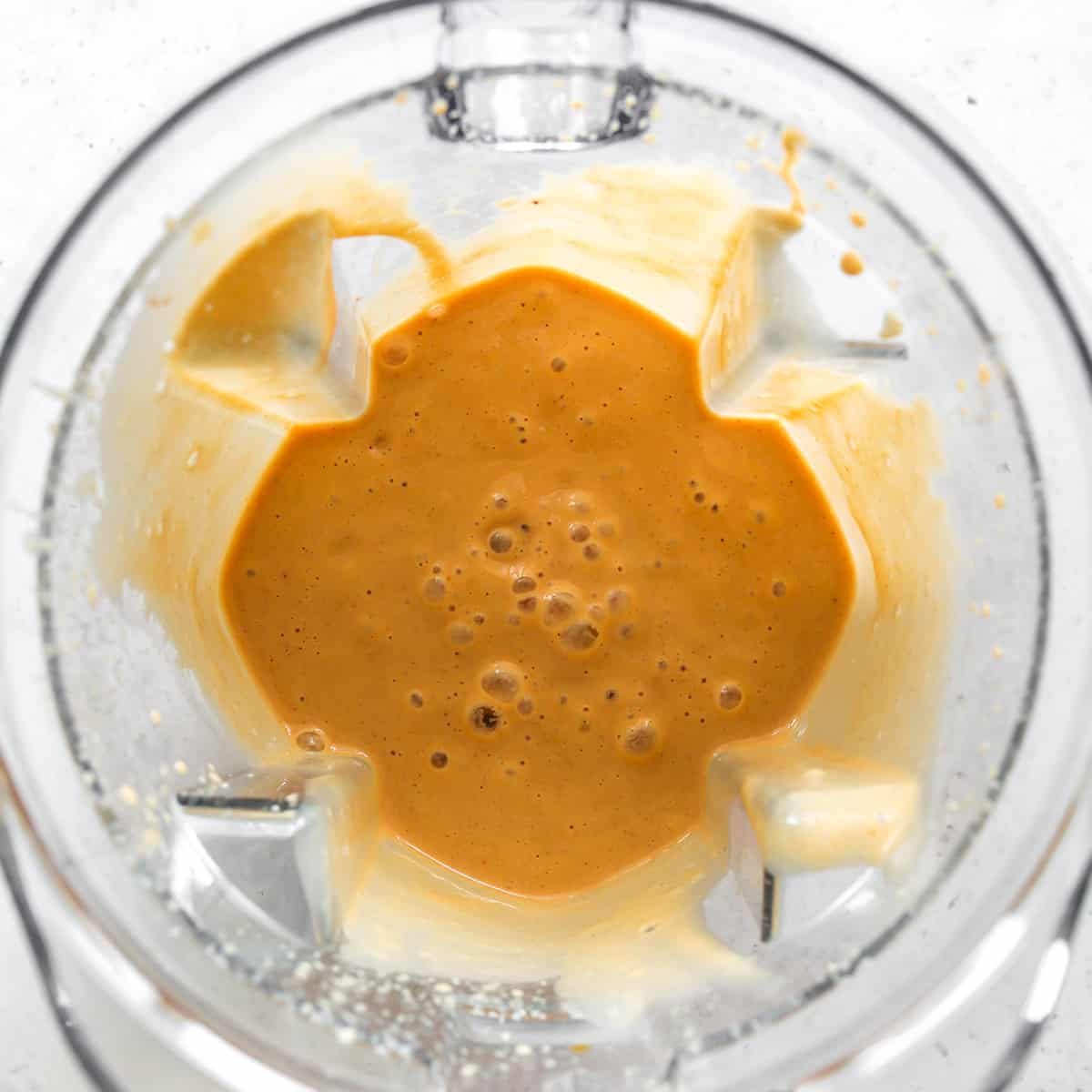overhead photo showing how to make a pumpkin smoothie
