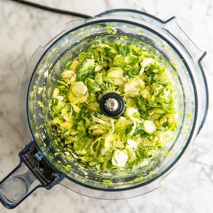 overhead photo of brussels sprouts shred in the Vitamix food processor