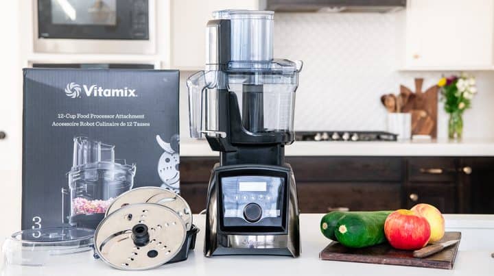 Vitamix food processor and accessories on a countertop