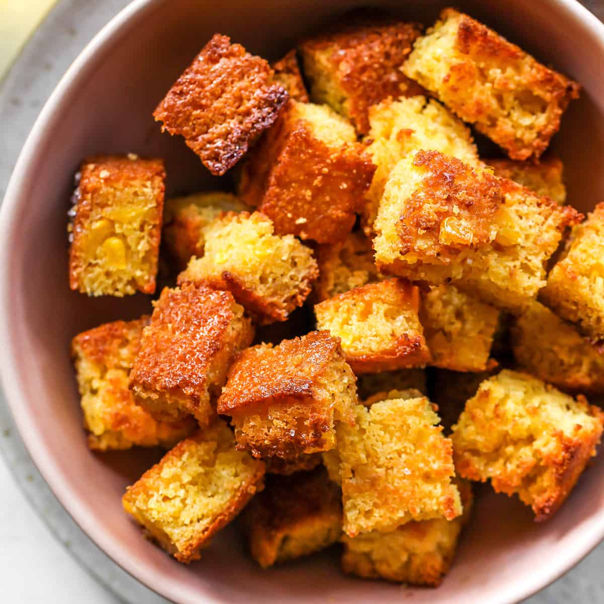 overhead view of a bowl of Cornbread Croutons