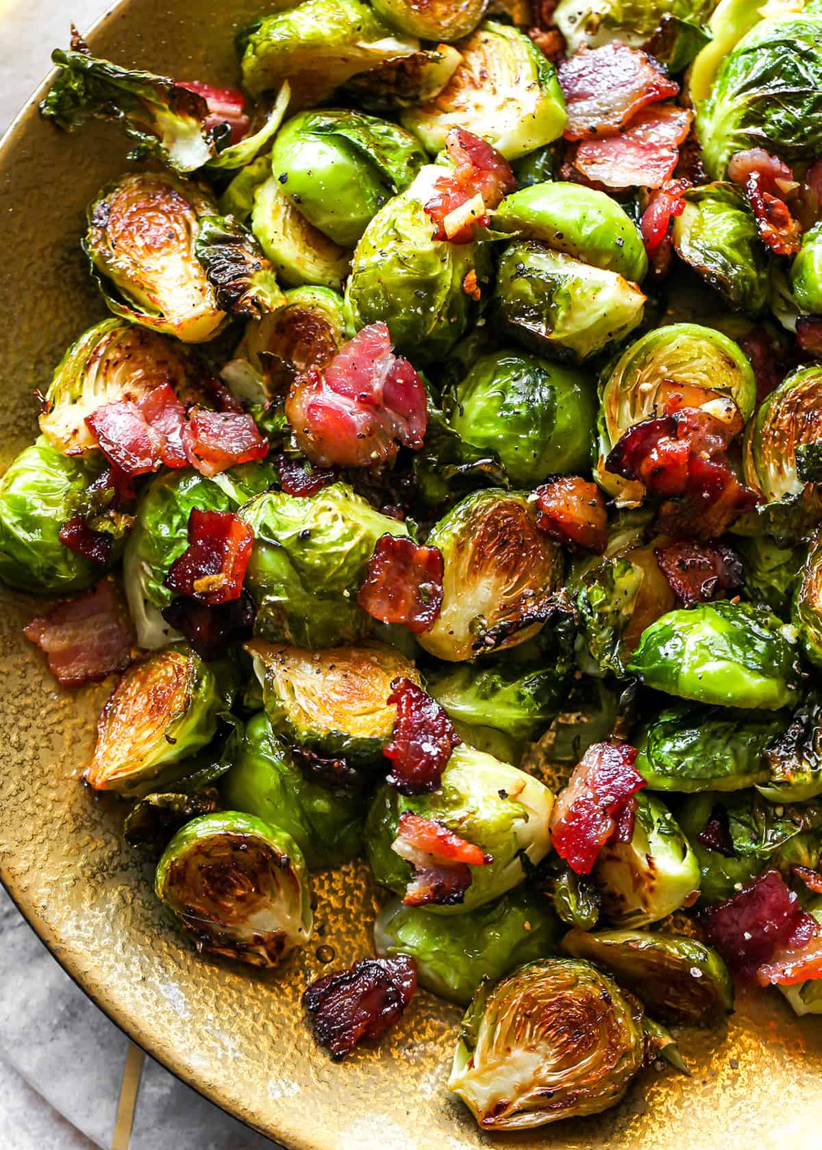 up close view of a plate of Roasted Brussel Sprouts with Bacon