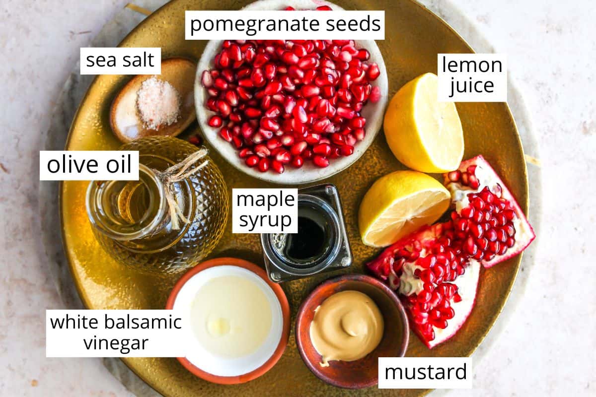 overhead view of the labeled ingredients in this Pomegranate Dressing (Pomegranate Vinaigrette) recipe
