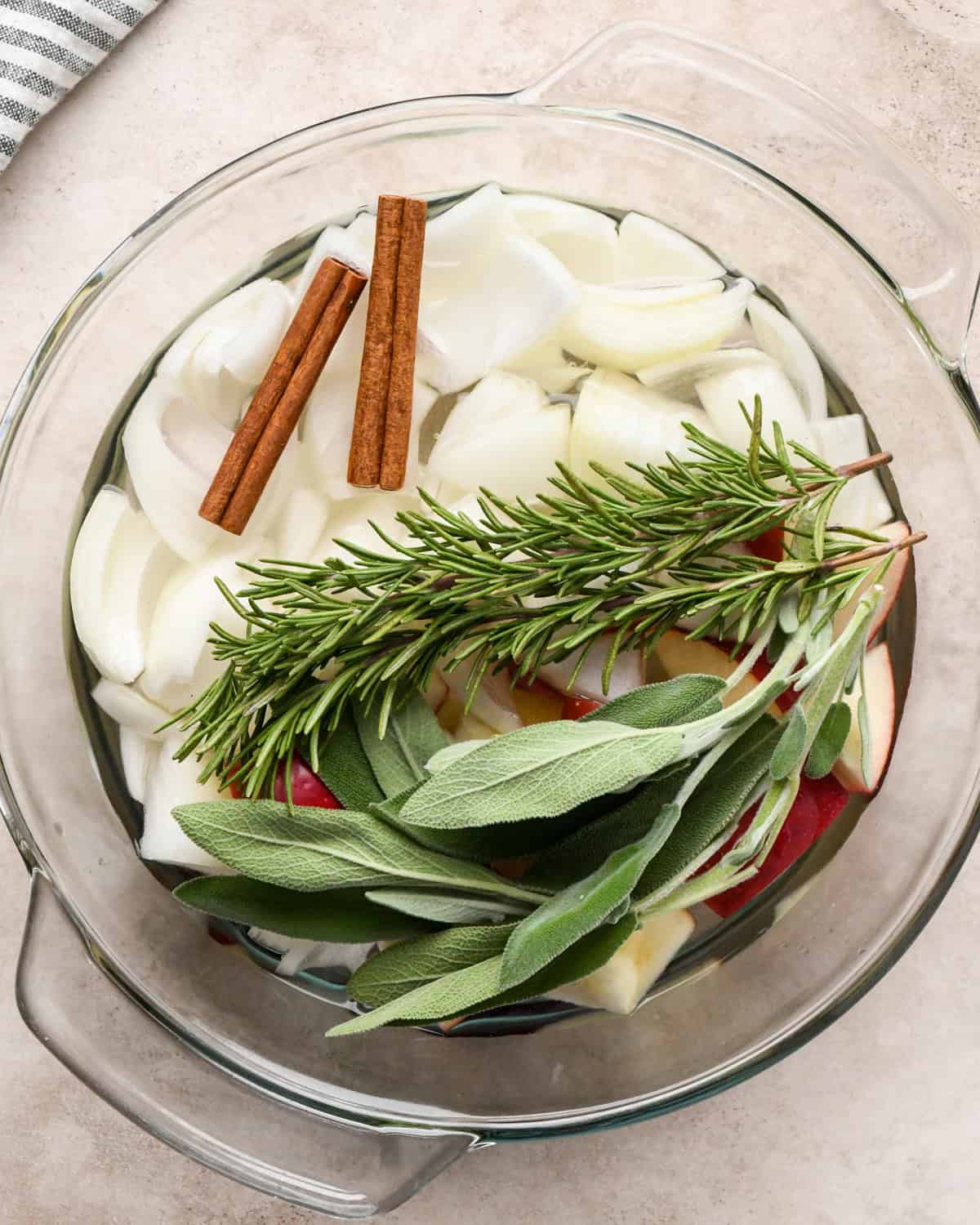 aromatics ingredients in a large glass bowl before cooking to use in this roast turkey recipe