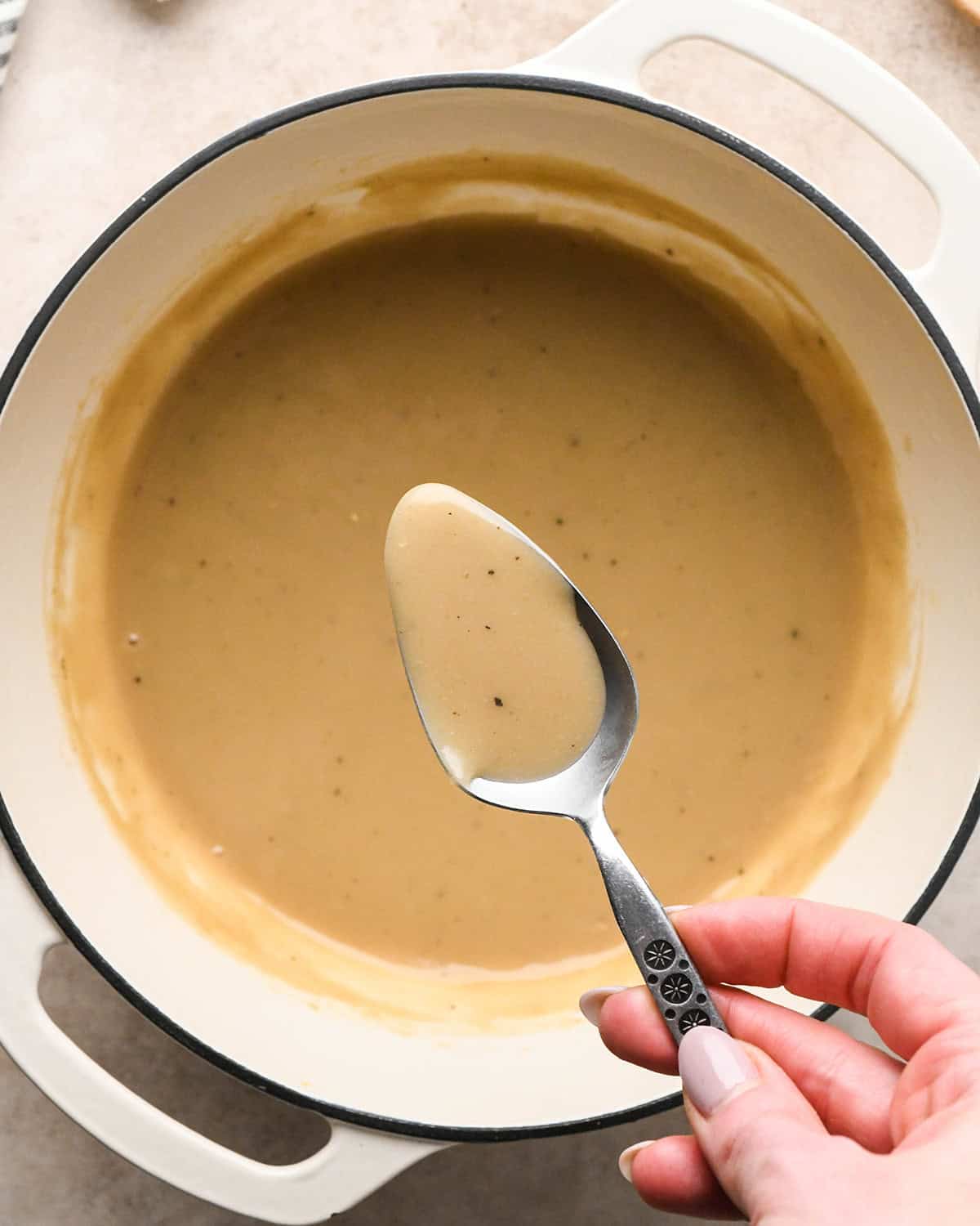 turkey gravy in a pot after cooking