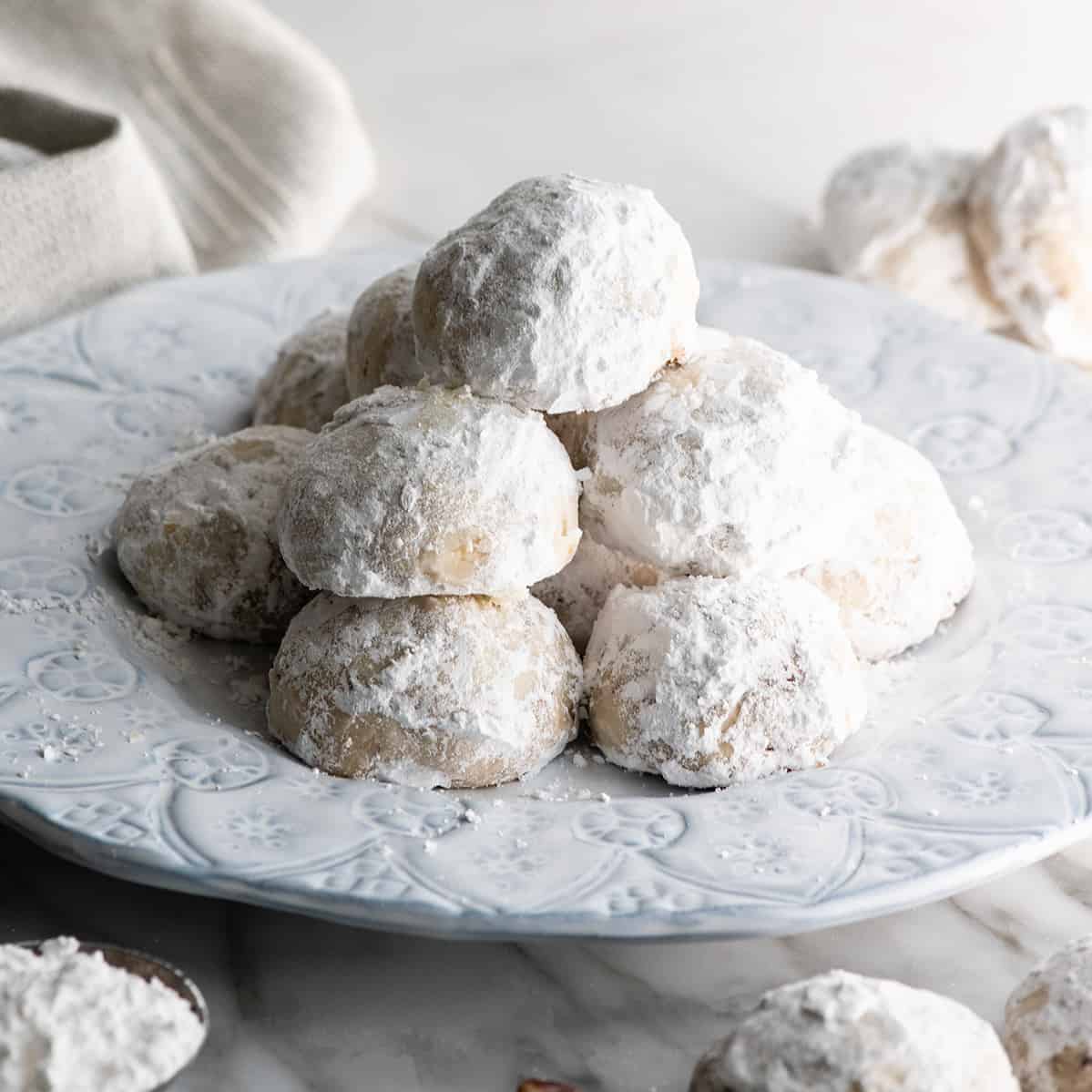 front view of a plate of Snowball Cookies