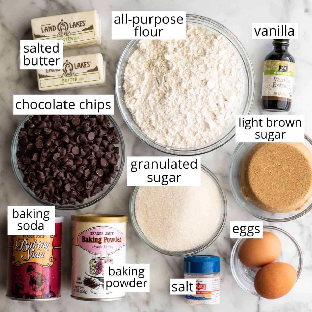 overhead photo of the labeled ingredients in this Chocolate Chip Cookie Cake Recipe