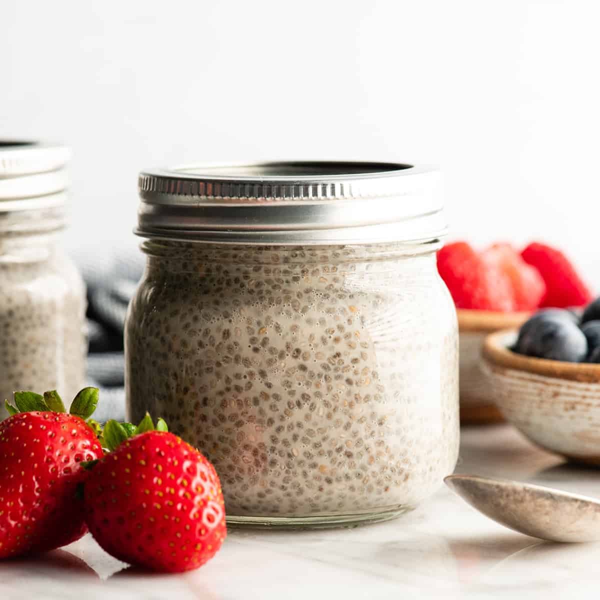 front view of a jar of chia seed pudding with the lid on