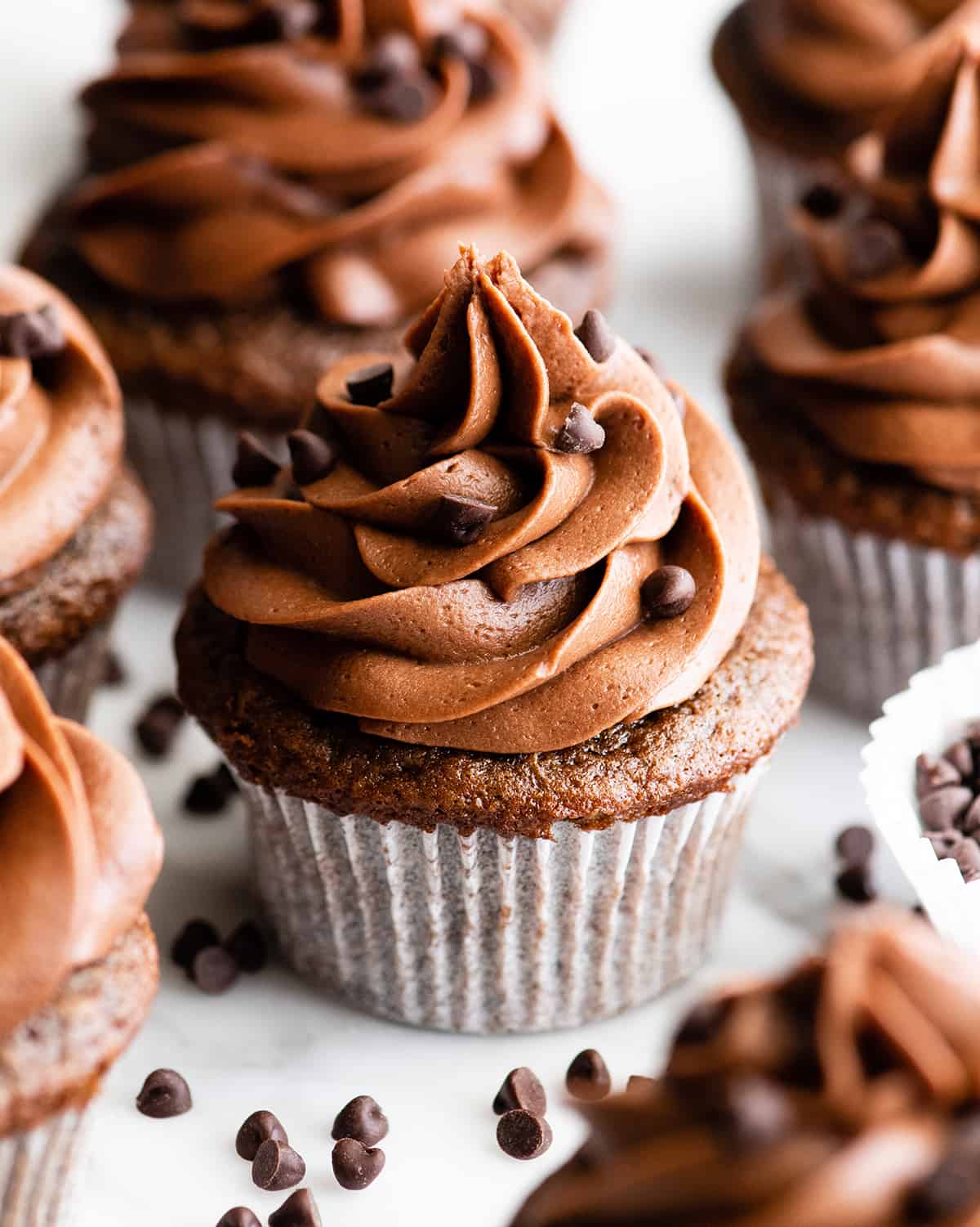front view of chocolate cupcakes with chocolate frosting
