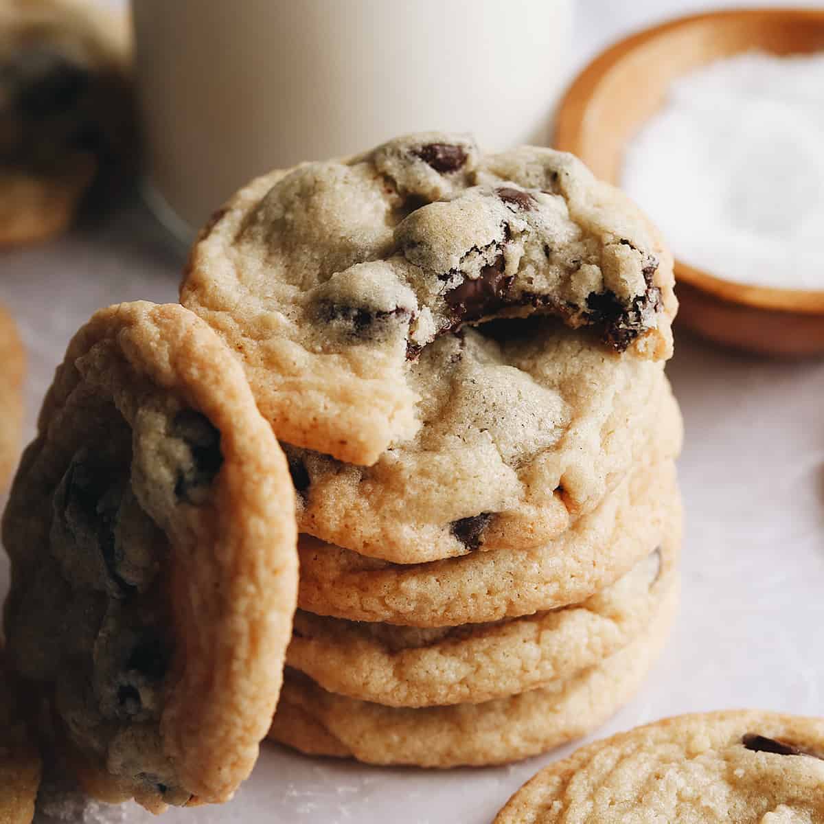 stack of 4 Gluten Free Chocolate Chip Cookies the top one with a bite taken out