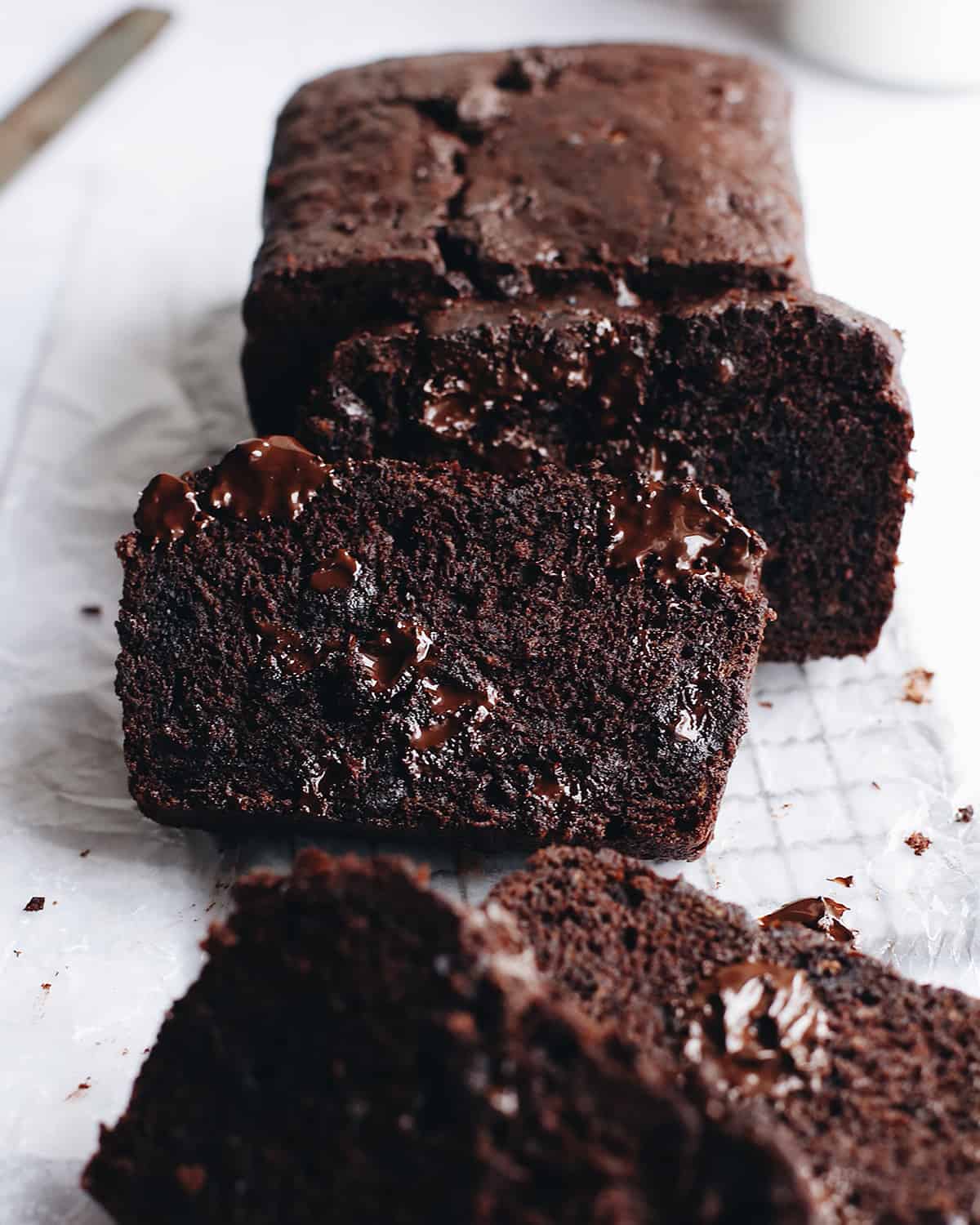 front view of a loaf of Chocolate Banana with four slices cut out