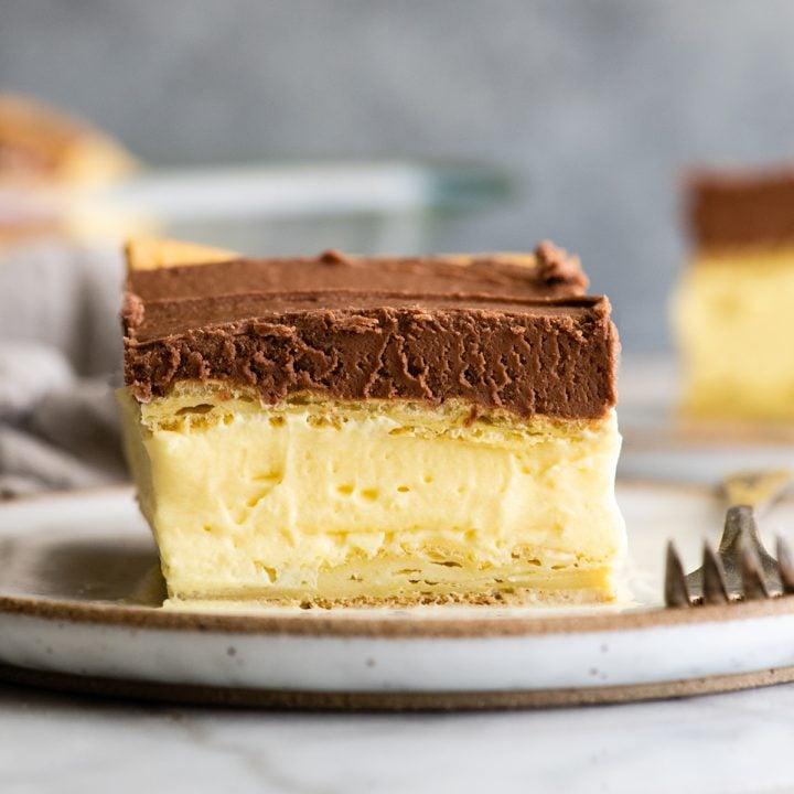 piece of Chocolate Eclair Cake on a plate 