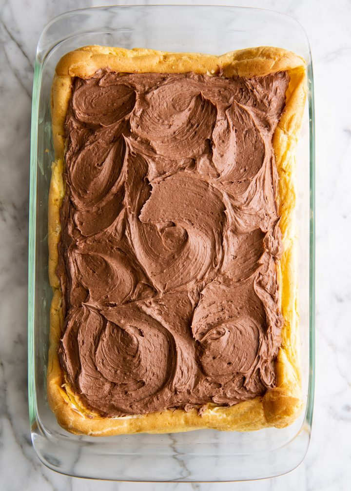 overhead photo of Chocolate Eclair Cake Recipe in a baking pan