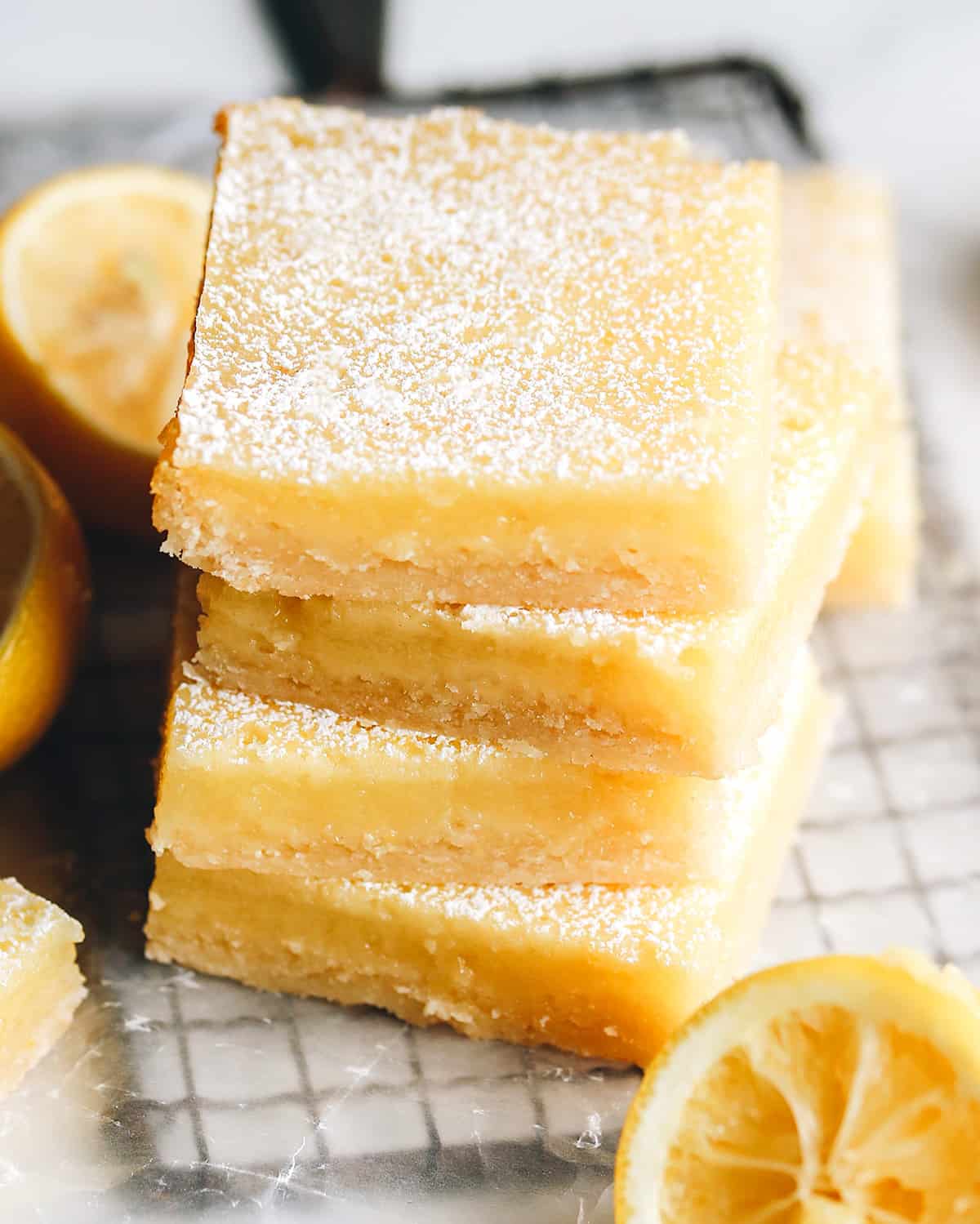 front view of a stack of 4 lemon bars