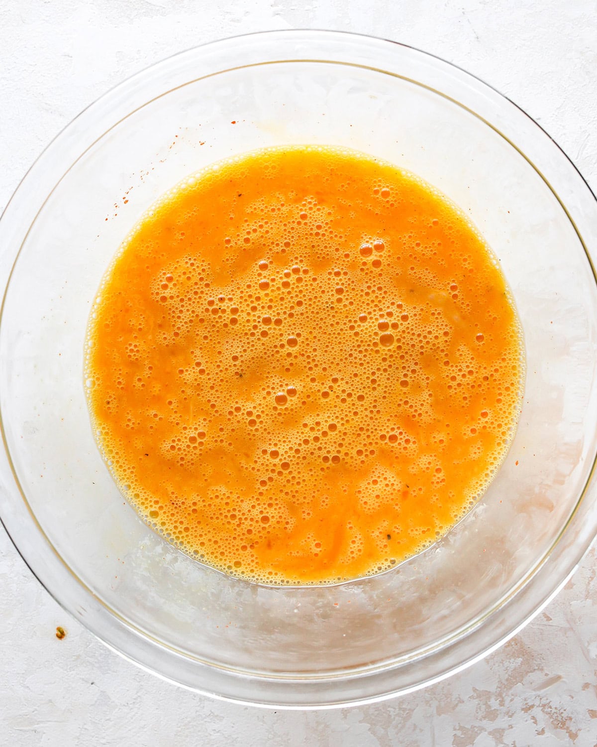 how to make egg bites -egg mixture in a bowl after mixing