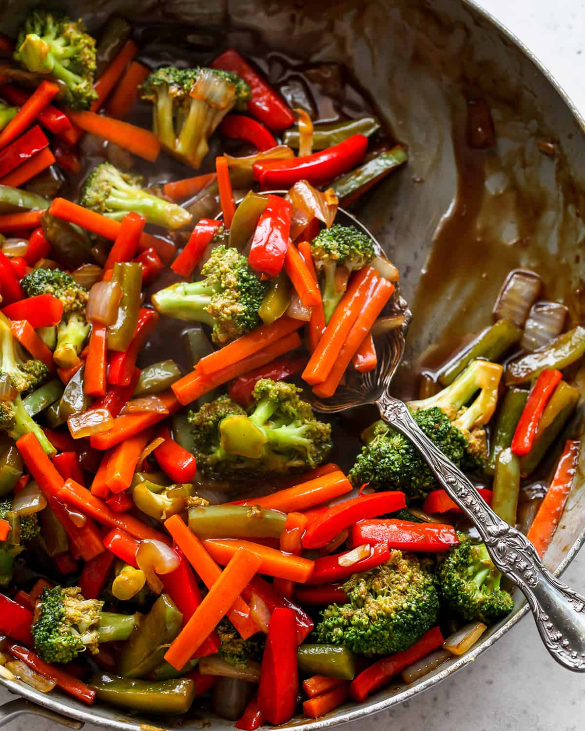 overhead photo of stir fry vegetables in a saute pan