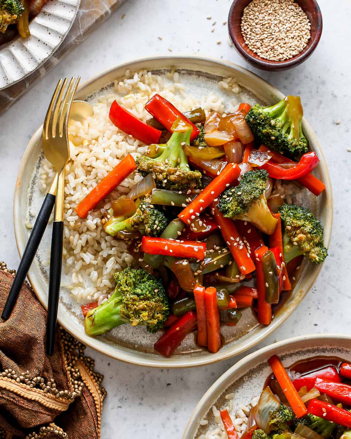 overhead view of a plate of stir fry vegetables with rice