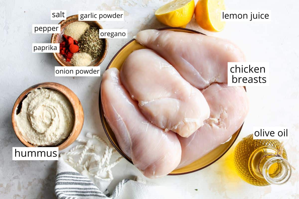 overhead photo of the labeled ingredients in this Baked Hummus Chicken Recipe