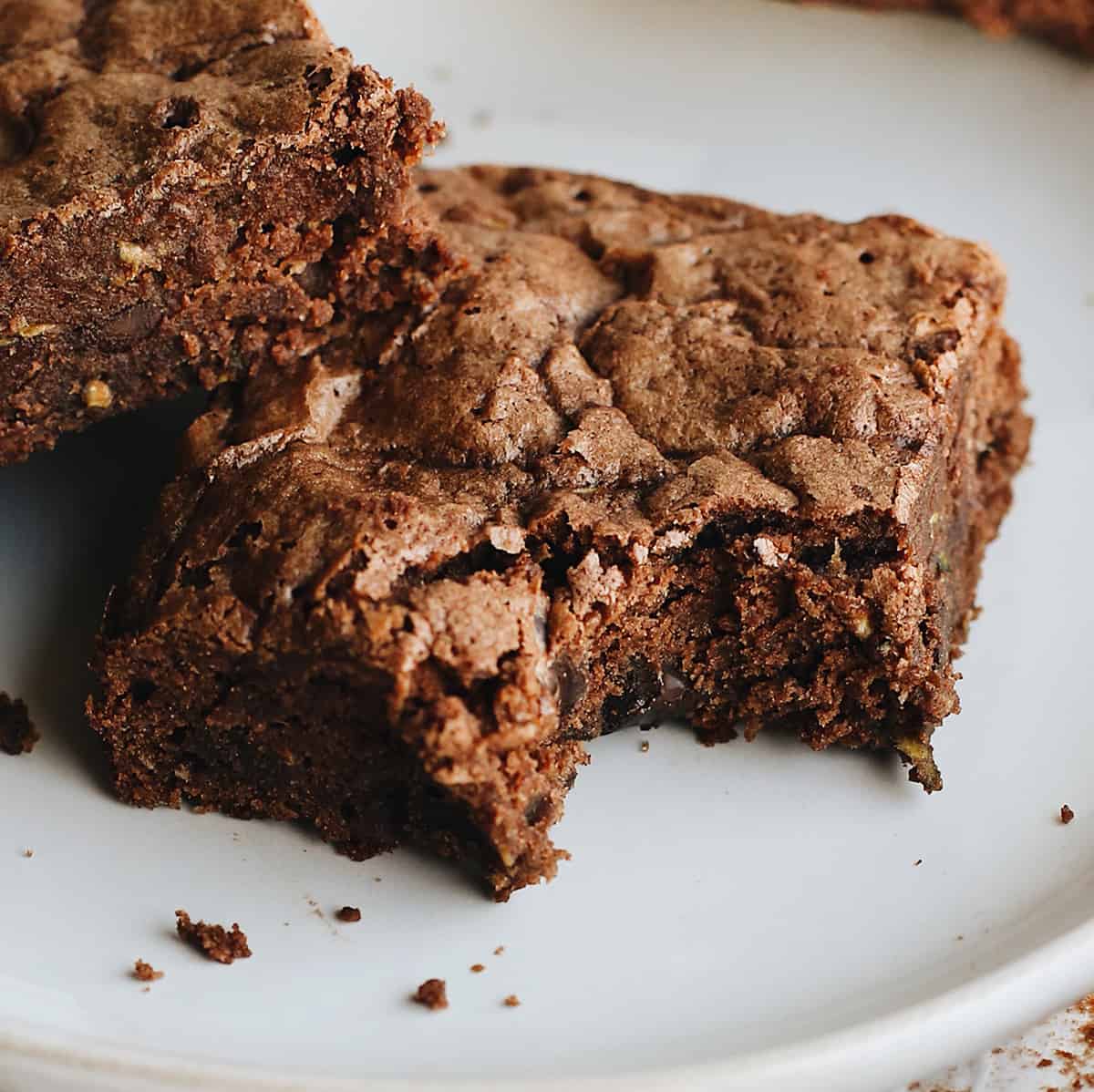 up close photo of a Chocolate Zucchini Brownie with a bite taken out of it