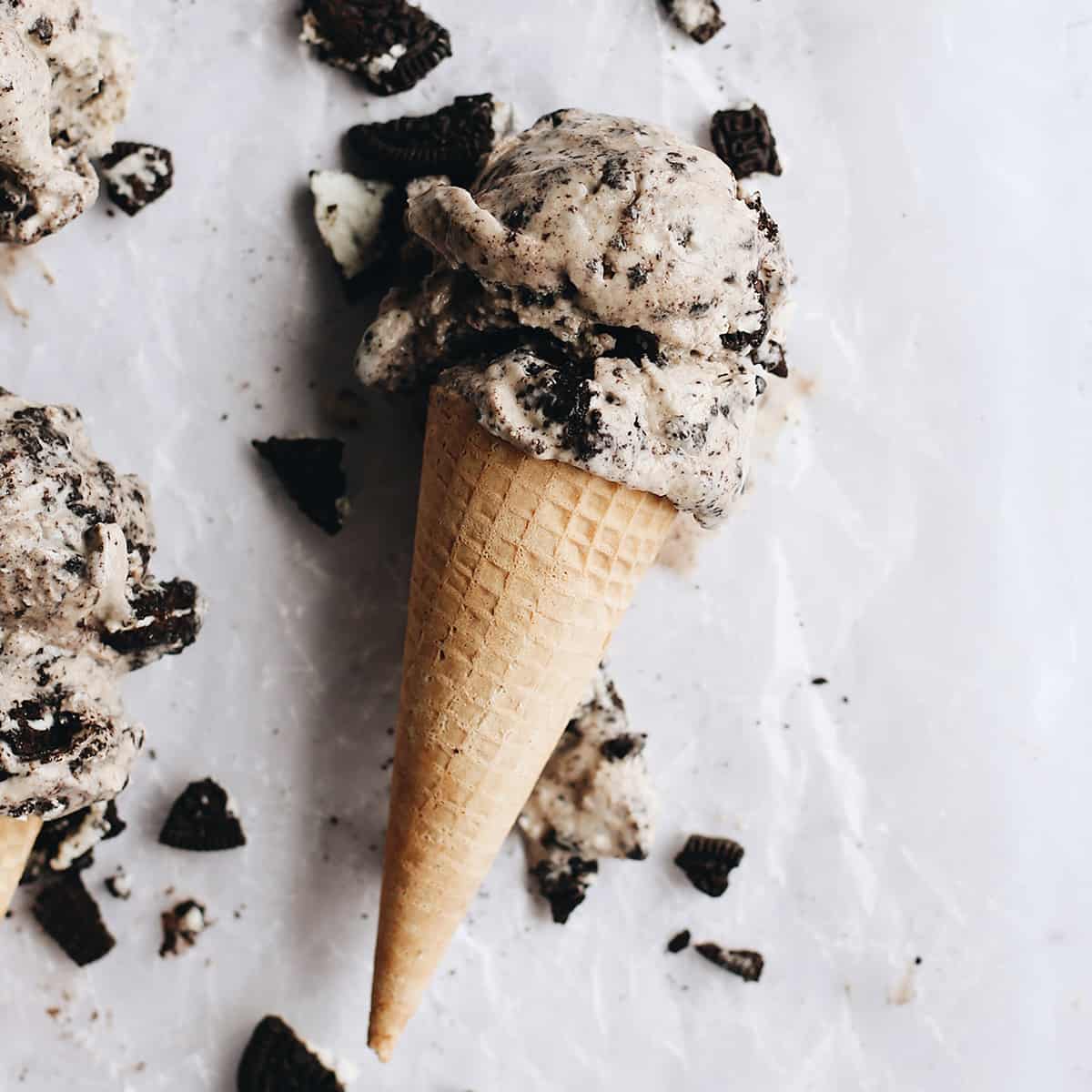overhead photo of a cone with two scoops of Cookies and Cream Ice Cream (Oreo Ice Cream)