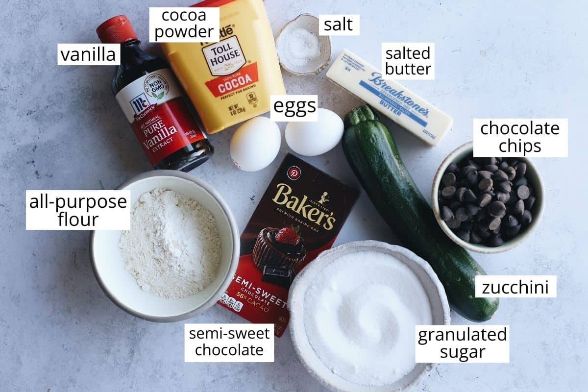 overhead photo of the labeled ingredients in this chocolate zucchini brownie recipe