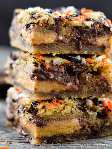 front view of a stack of 3 Candy Cookie Bars.