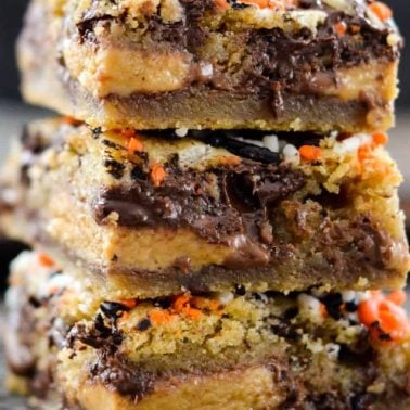 front view of a stack of 3 Candy Cookie Bars.