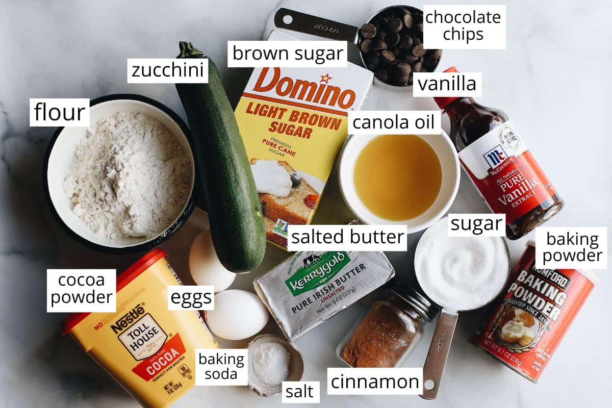 overhead photo of the labeled ingredients in this double chocolate zucchini bread recipe