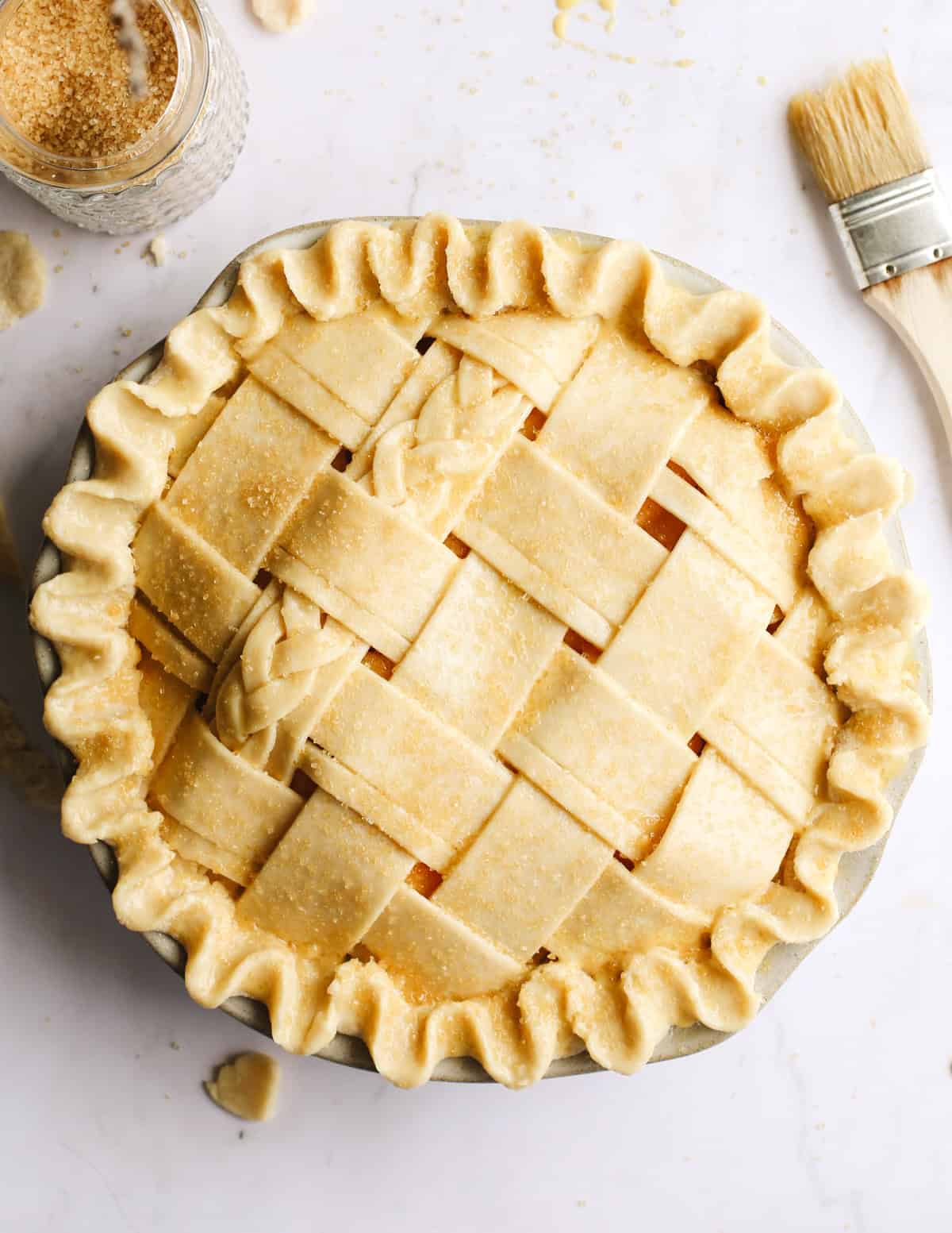 Peach Pie with a lattice crust before being baked