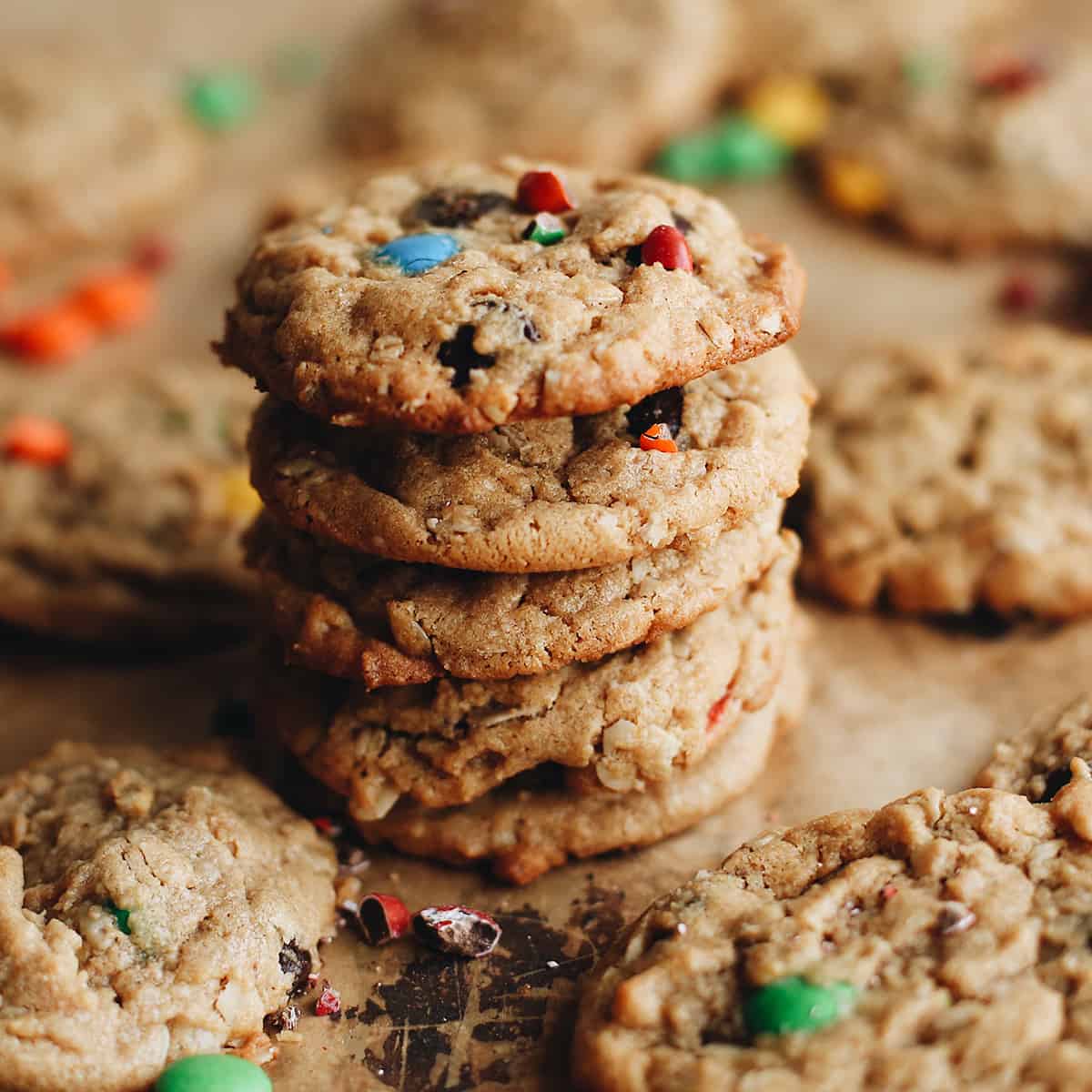 stack of 5 Monster Cookies with others around it 