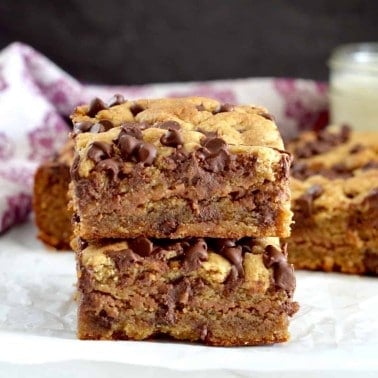 Front view of two vegan paleo blondies stacked on top of each other.