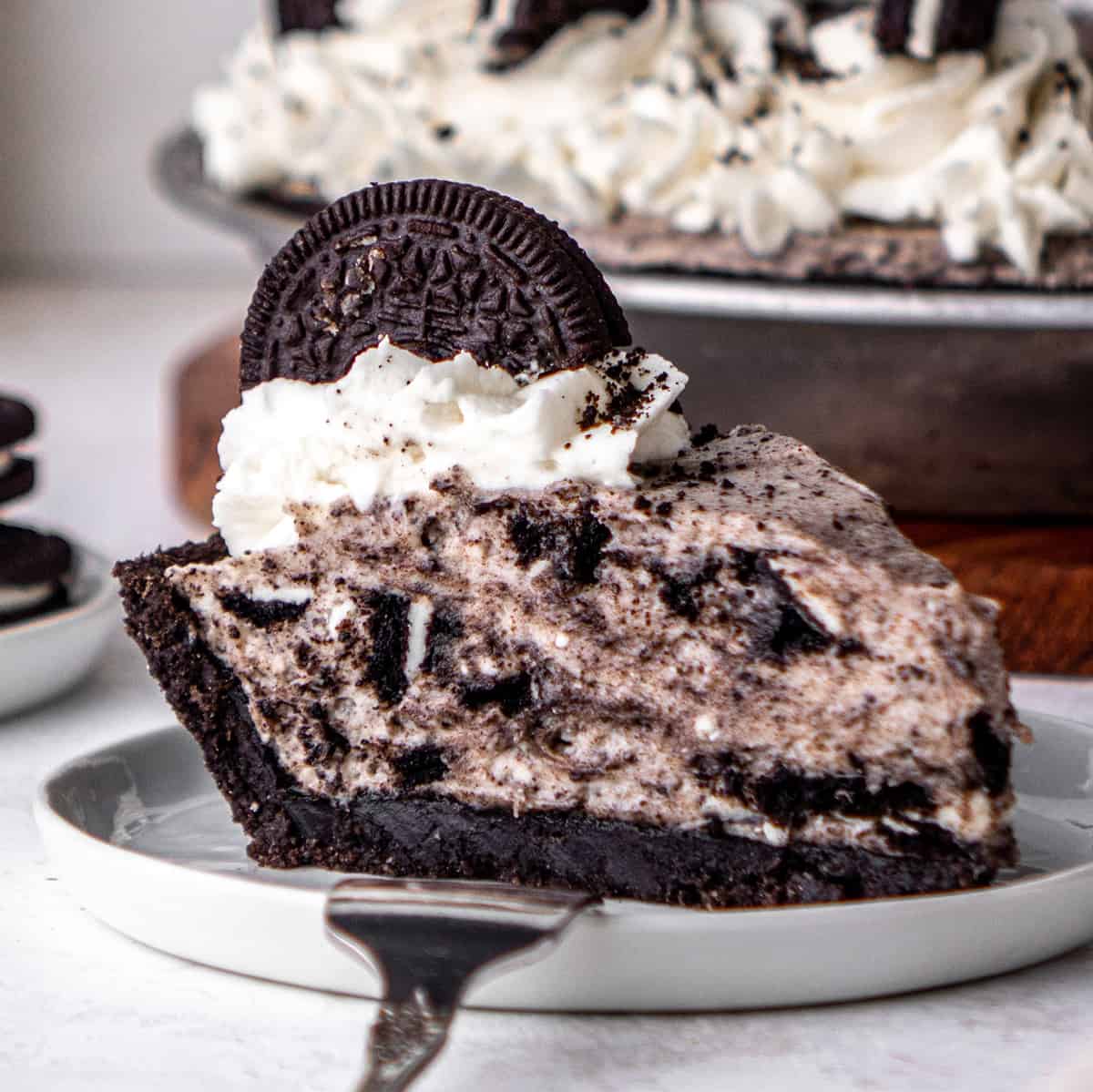 a slice of Oreo Pie on a plate wiht a fork