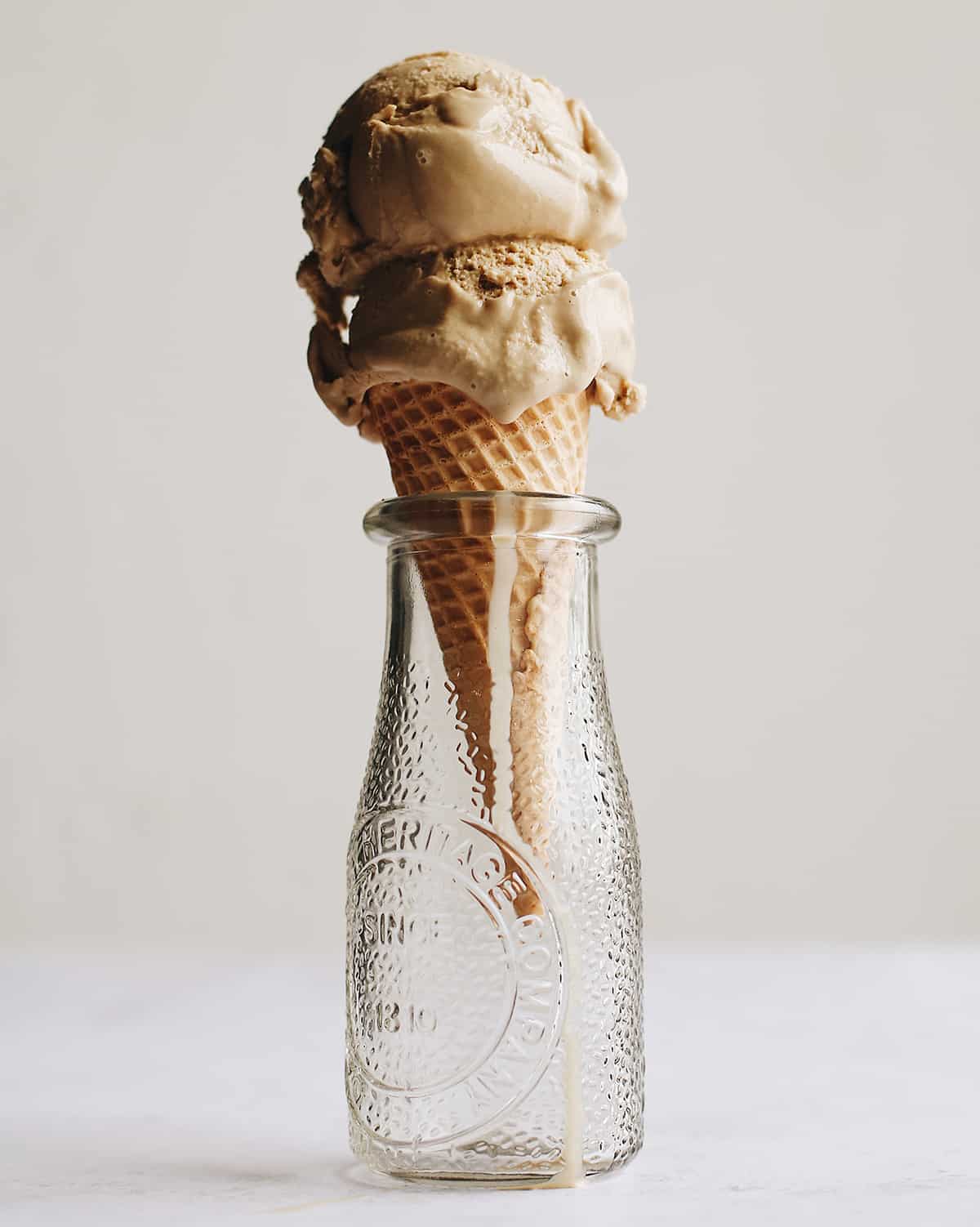 two scoops of Coffee Ice Cream on an ice cream cone 